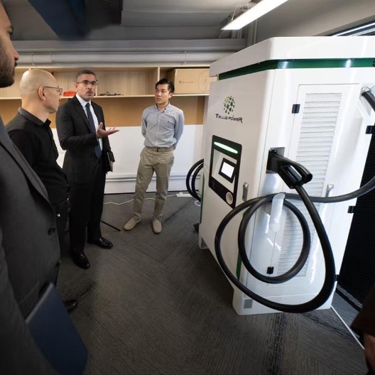Picture with Tellus Power EV Charger.jpg